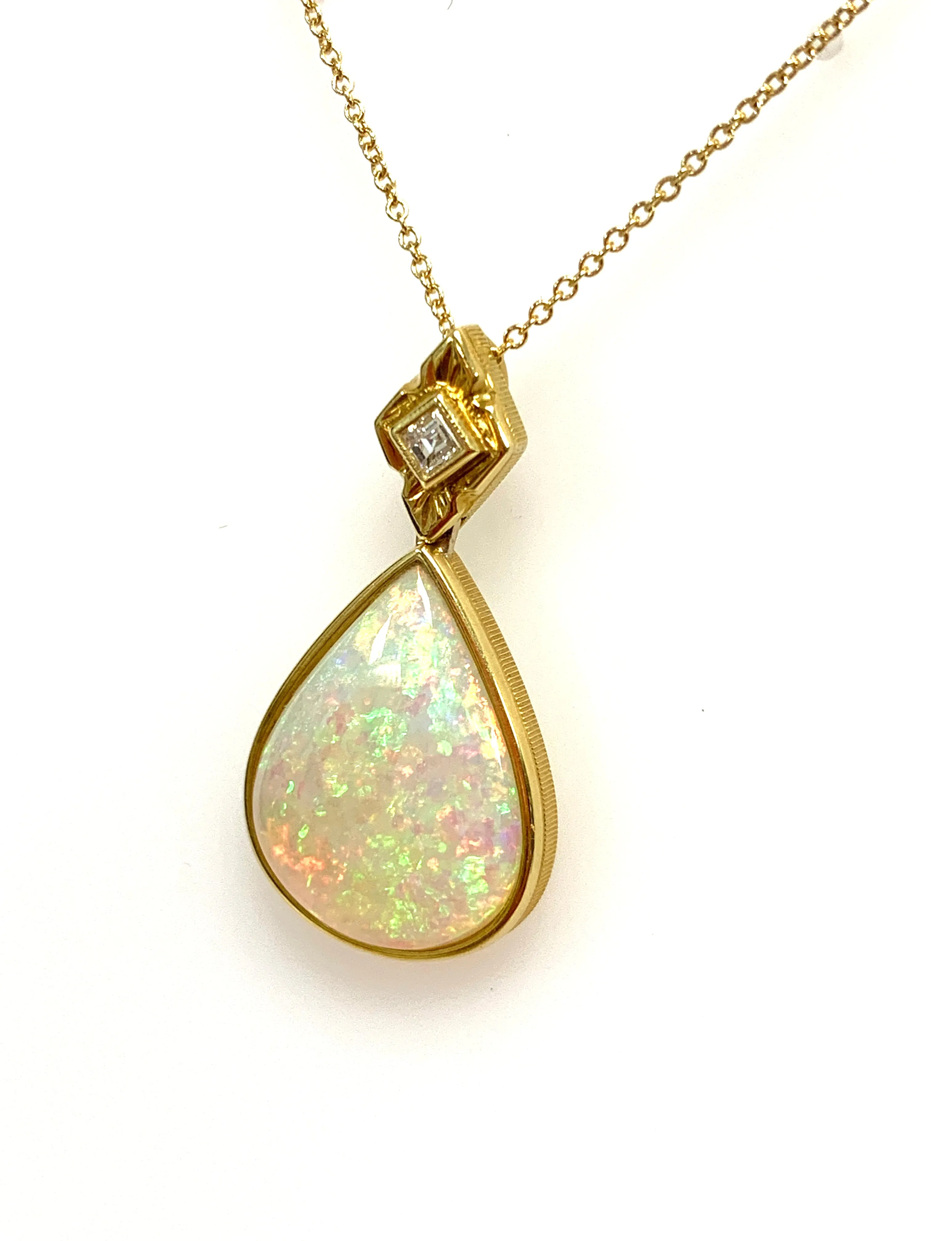 6.83 ct. Pear Shape Opal and Diamond Yellow Gold Bezel Set Drop Pendant
