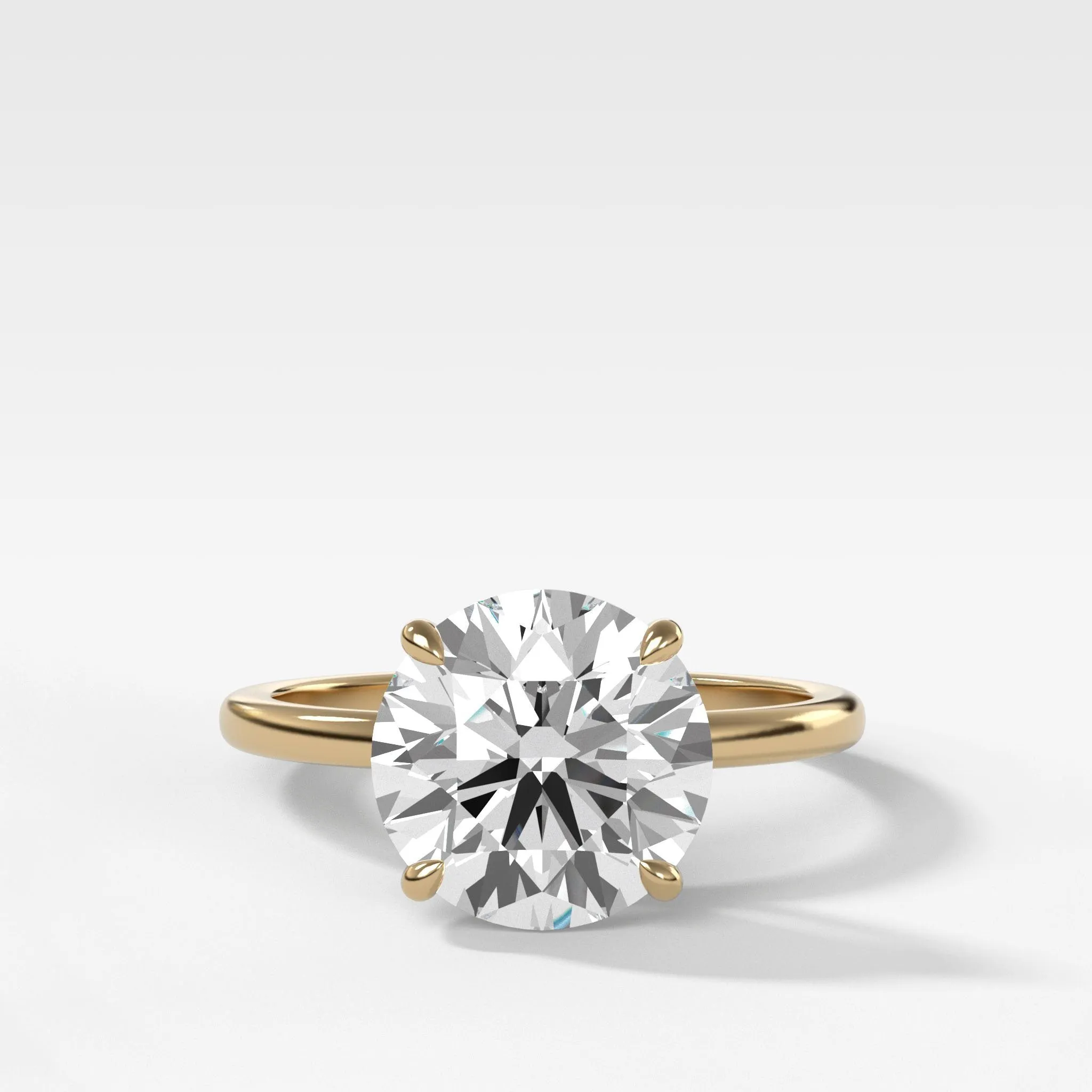 Crescent Solitaire Engagement Ring With Round Cut Diamond