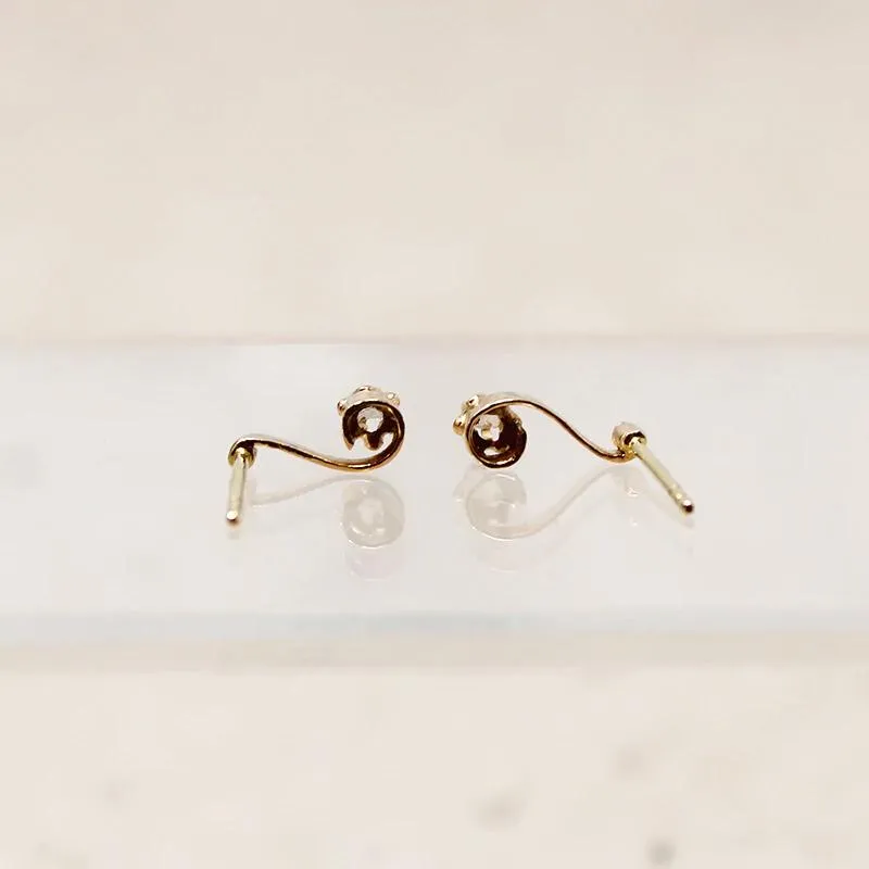 Delicate Diamond-Set Musical Note Studs