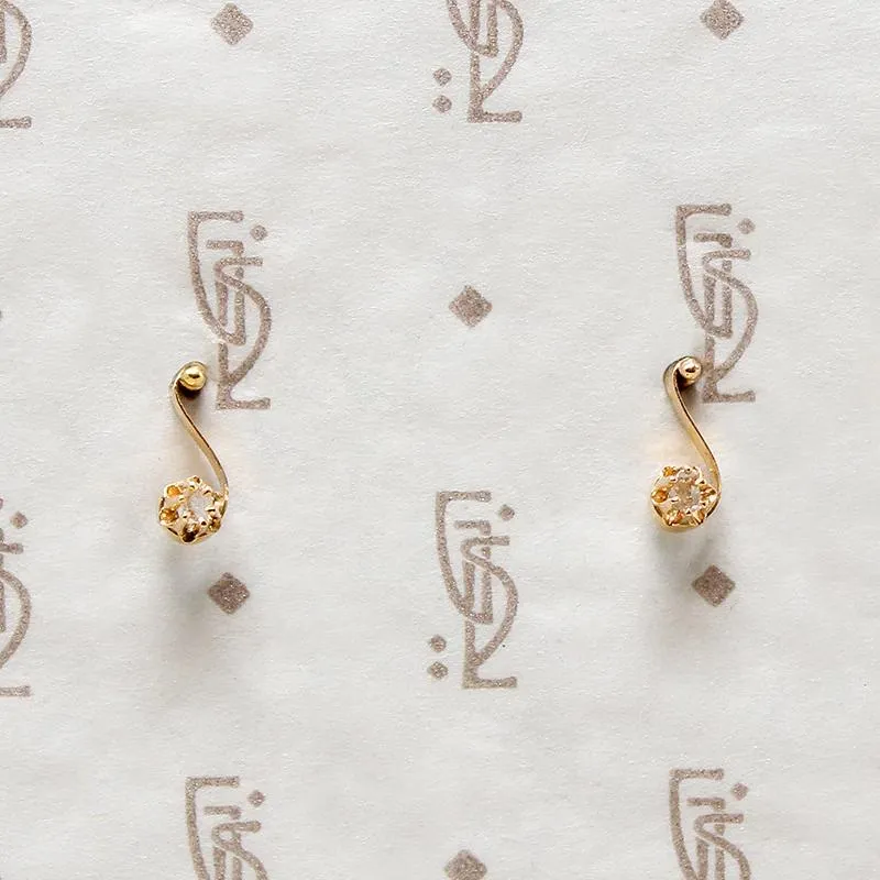 Delicate Diamond-Set Musical Note Studs