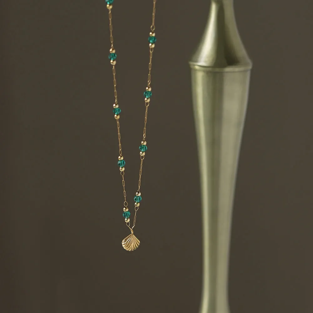 Delicate Gold-Plated Shell Pendant Necklace with Green Glass Beads