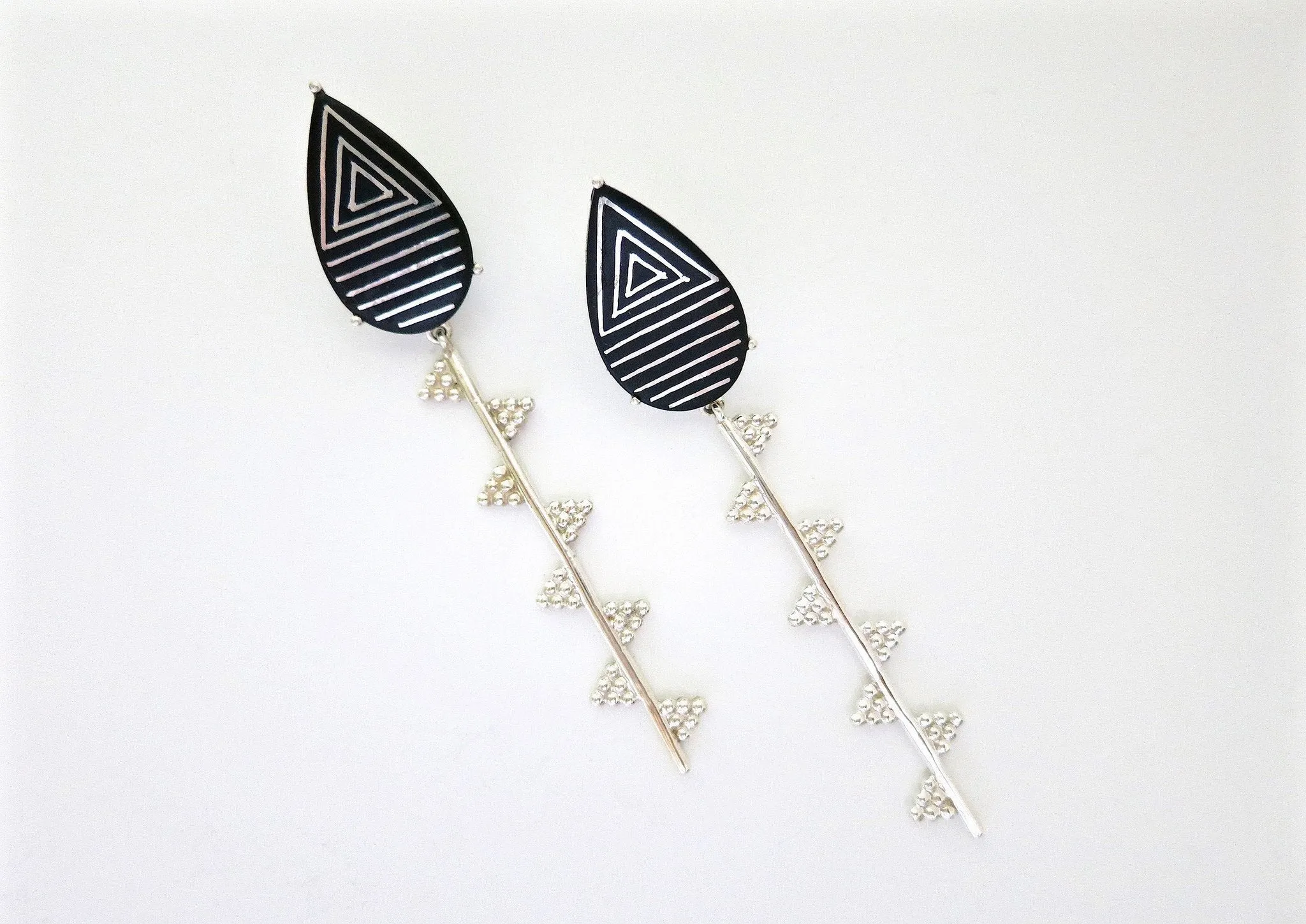 Exquisite, sleek, long Bidri earrings with granulation work