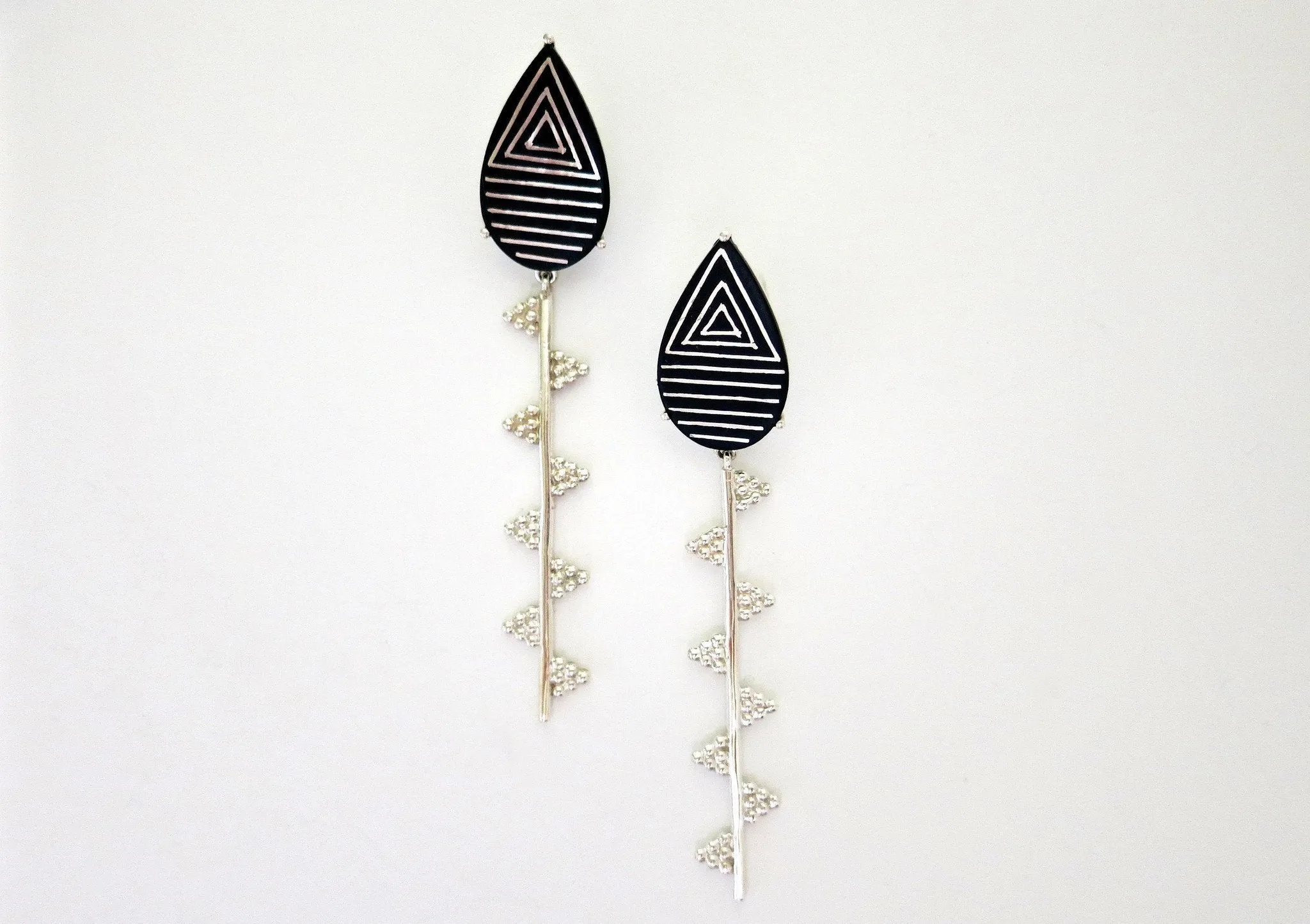Exquisite, sleek, long Bidri earrings with granulation work