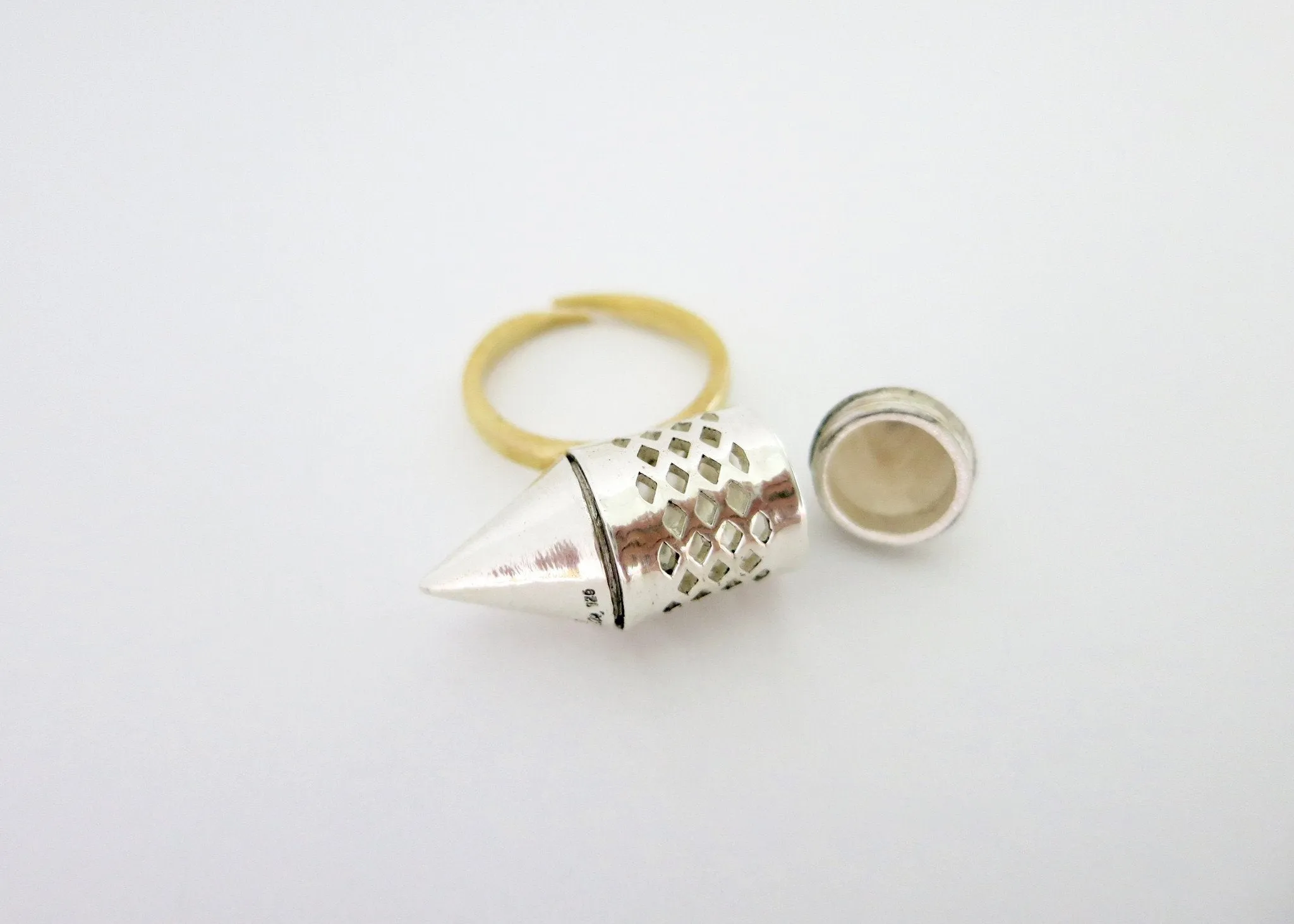 Exquisite, sterling silver, tubular amuletic ring with a gold-plated brass shank