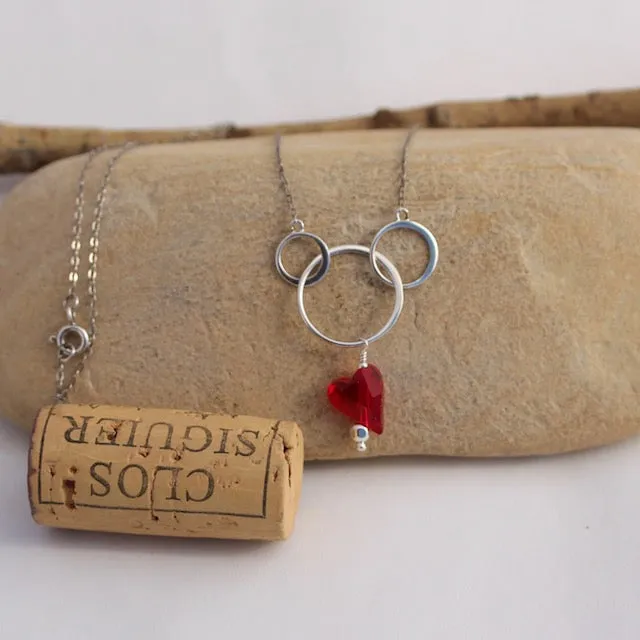 Sterling silver chain necklace with circles and Swarovski crystal heart pendant