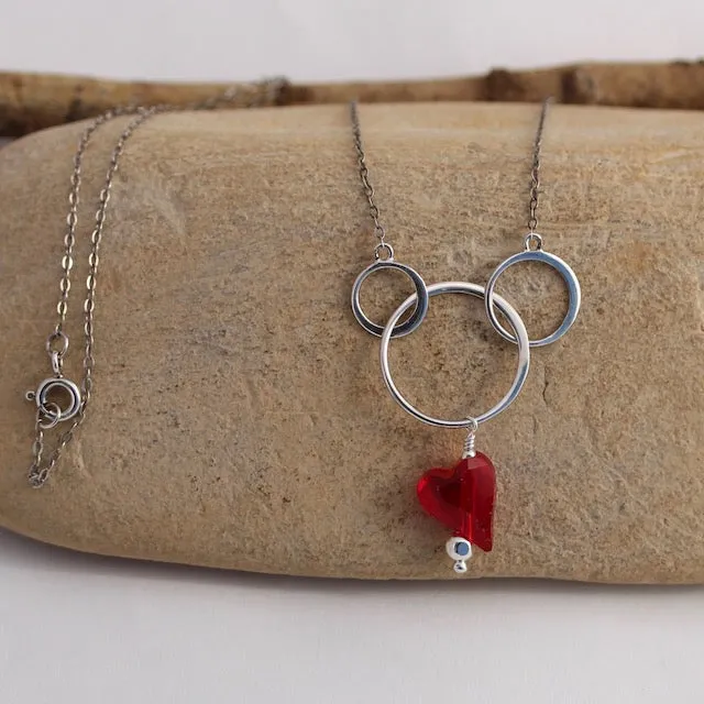 Sterling silver chain necklace with circles and Swarovski crystal heart pendant