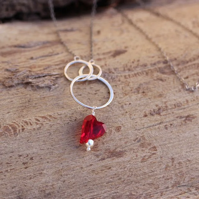 Sterling silver chain necklace with circles and Swarovski crystal heart pendant