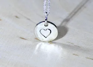 Sterling Silver Disc with a Heart Theme