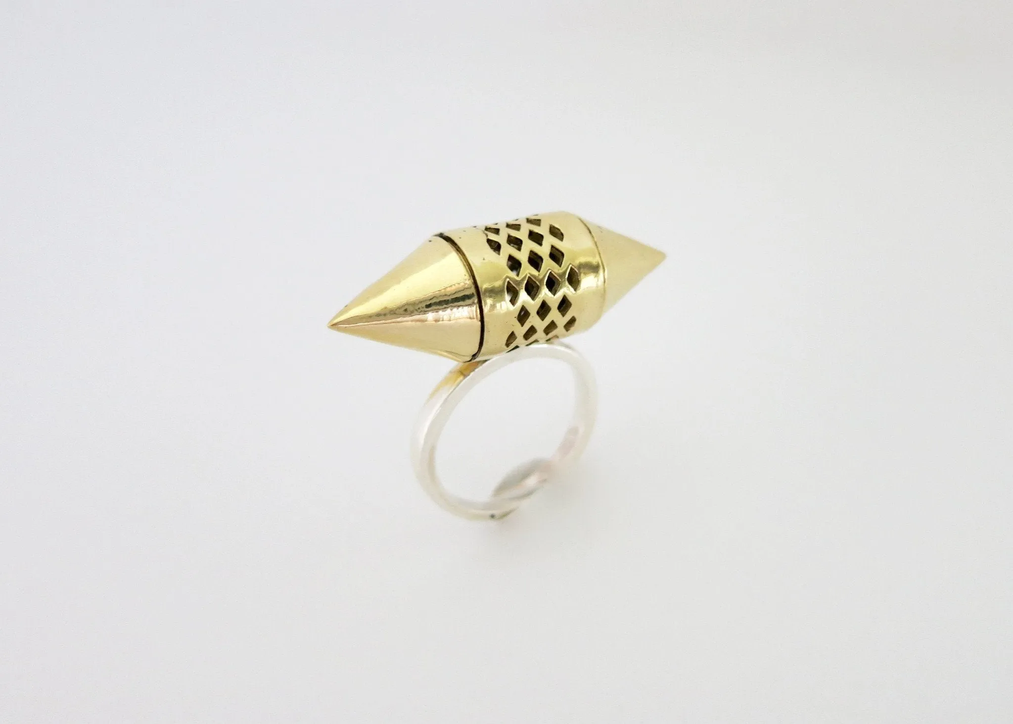 Unique, gold-plated brass tubular amuletic ring with a sterling silver shank
