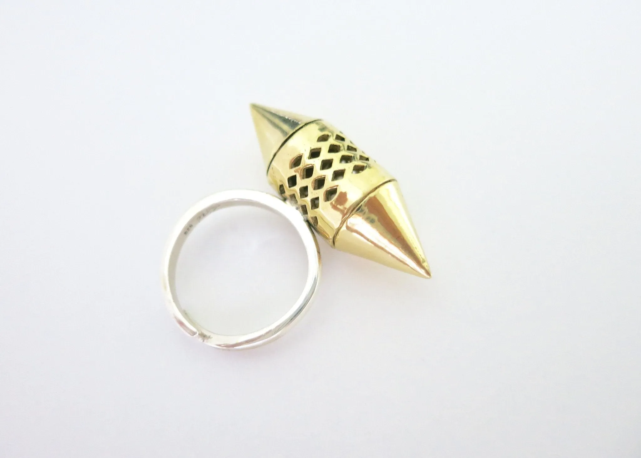 Unique, gold-plated brass tubular amuletic ring with a sterling silver shank
