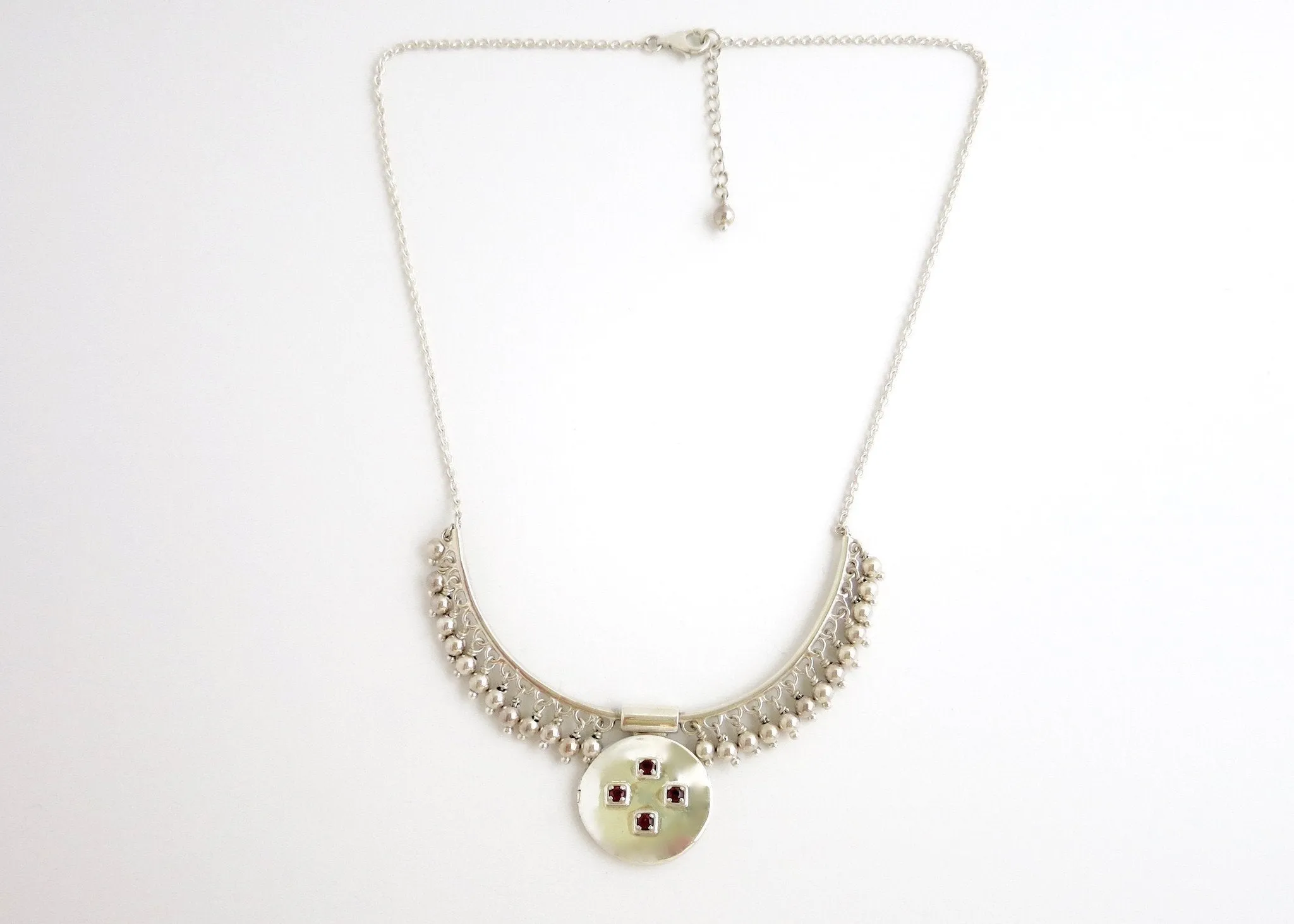 Vintage inspired, unique locket necklace in sterling silver and garnet